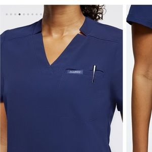 Like new Jaanuu navy scrub top in XL